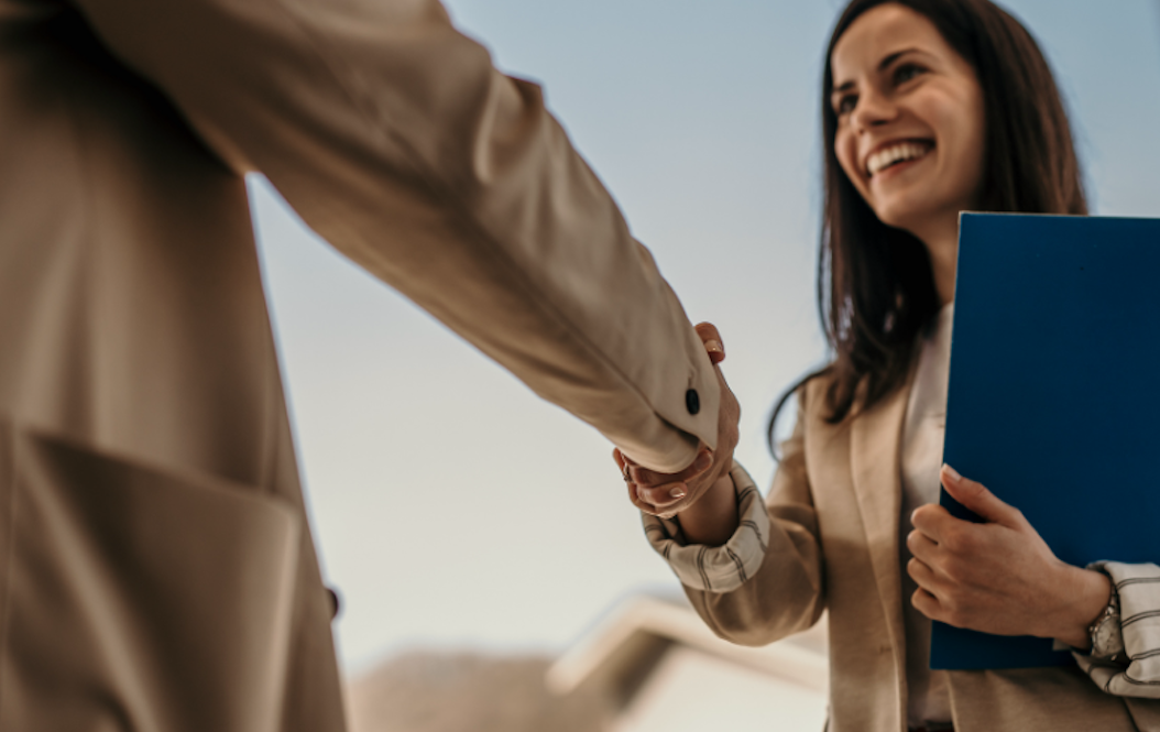aviation recruiter shaking hands with job candidate - how to standout during the hiring process