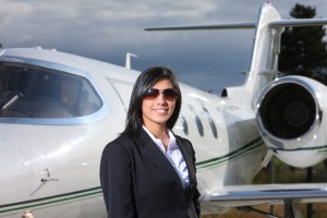Sucessful businesswoman with jet - traits of chief pilot