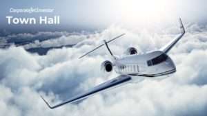 cji town hall - corporate jet investor logo - plane flying in clouds