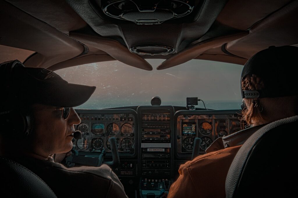 retention strategies - two male pilots in general aviation aircraft