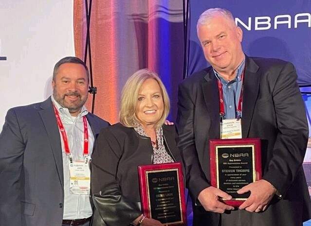 The NBAA IOC Chair, John Tuten, presented the Guy Gribble IOC AppreciationAward to Debbi Laux and Steve Thorpe, members of the IOC Committee.