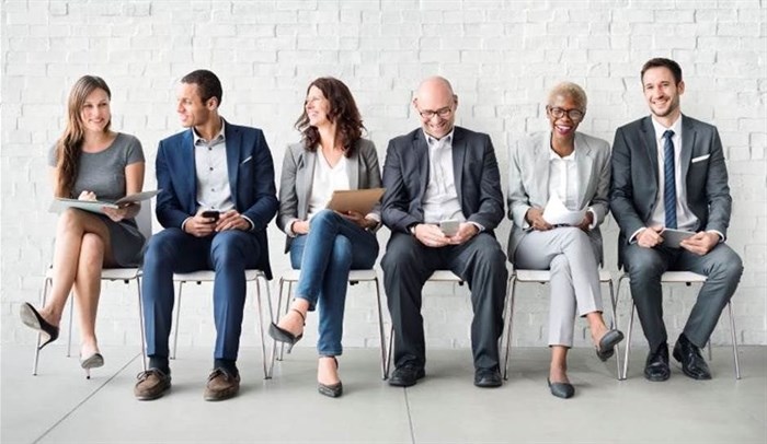 five generations in the workplace - six people sitting on chairs