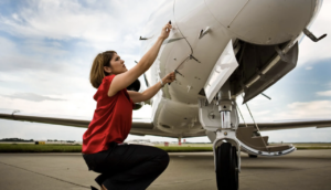 hiring outlook for business aviation female outside of business jet working