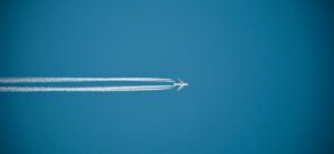 Elevate Your Bizav Career with Professional Development Certifications and volunteering make you stand out for promotions and hiring - photo of aircraft contrails in sky