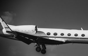 private jet descening alec cooks unsplash dom to doa blog maintenance