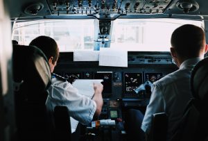 Corporate Aviation vs. Airlines: Two Pilots Weigh In - pilots in cockpit