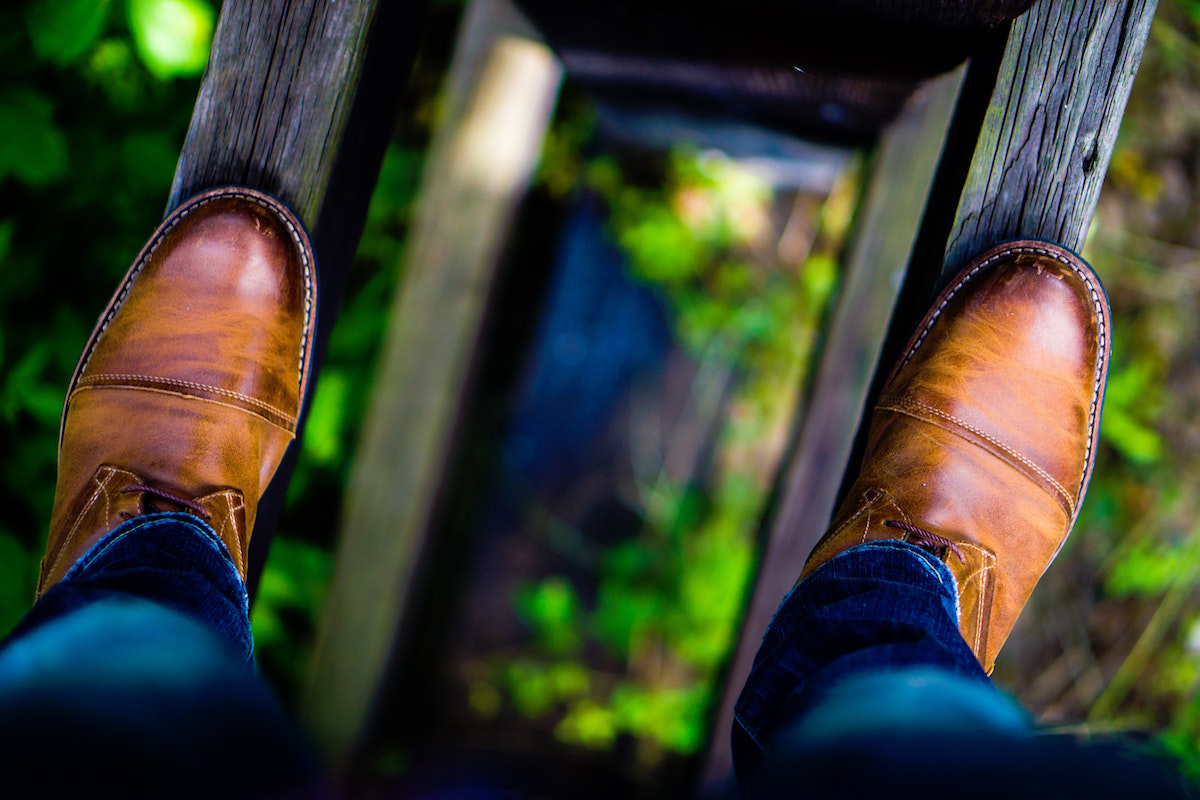 man standing on bridge - bridge job - api aviation