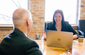 chief pilot overqualified candidates job interview man and woman at table